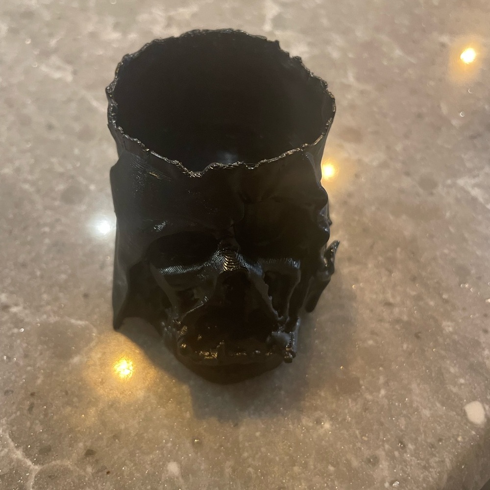 Melted darth vader plant pot